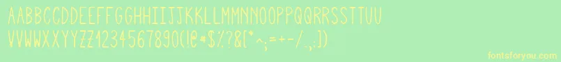 Squigglyasta Font – Yellow Fonts on Green Background