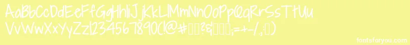 フォントAlpineScript – 黄色い背景に白い文字