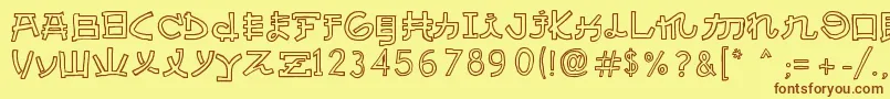 フォントAlmostJapaneseCartoon – 茶色の文字が黄色の背景にあります。