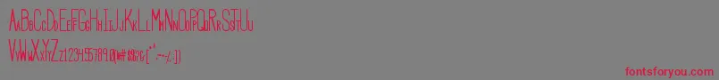 フォントHbmSerenityBold – 赤い文字の灰色の背景