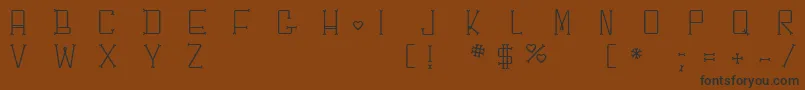 Chesbone Font – Black Fonts on Brown Background