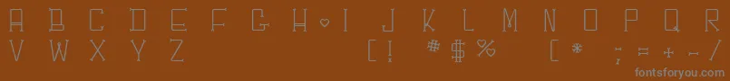 Chesbone Font – Gray Fonts on Brown Background