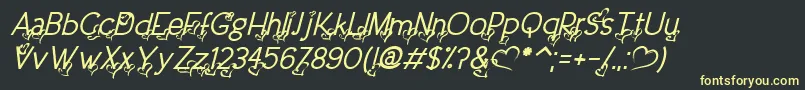 フォントDreamLoveValentineItalic – 黒い背景に黄色の文字