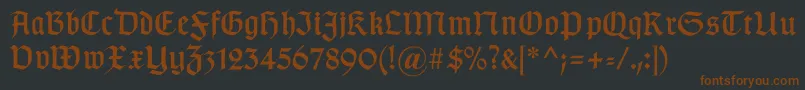Gotischc-fontti – ruskeat fontit mustalla taustalla