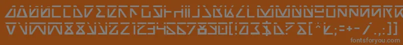 フォントNickTurboLaser – 茶色の背景に灰色の文字