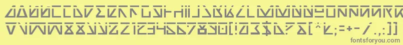 フォントNickTurboLaser – 黄色の背景に灰色の文字