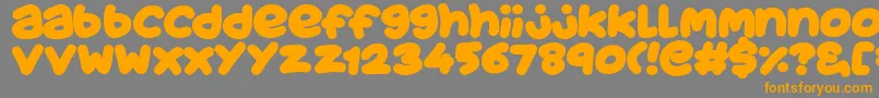 JuicyFruityPlain Font – Orange Fonts on Gray Background