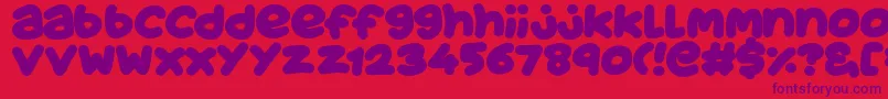 JuicyFruityPlain Font – Purple Fonts on Red Background