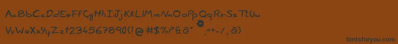 フォントNonciclopediaBySabakuPiccolo – 黒い文字が茶色の背景にあります