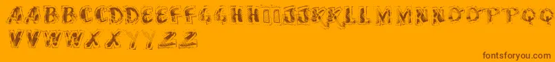 Vtkssscubbed-Schriftart – Braune Schriften auf orangefarbenem Hintergrund