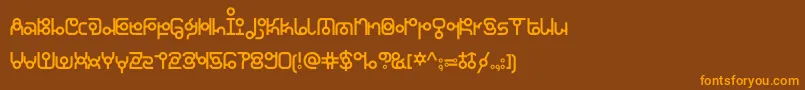 フォントKdthaianajonesRegular – オレンジ色の文字が茶色の背景にあります。