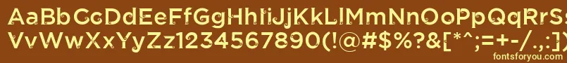 JathilanRegular-fontti – keltaiset fontit ruskealla taustalla