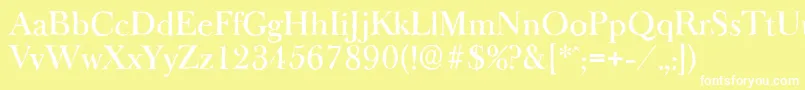 BaskeroldantiqueMediumRegular-fontti – valkoiset fontit keltaisella taustalla