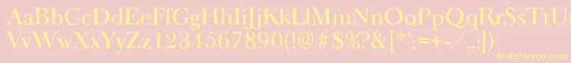 BaskeroldantiqueMediumRegular-fontti – keltaiset fontit vaaleanpunaisella taustalla