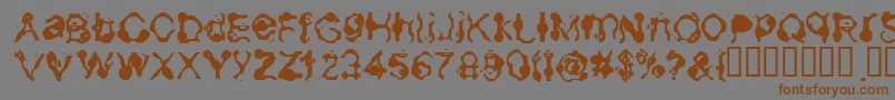 Aneurysm-Schriftart – Braune Schriften auf grauem Hintergrund
