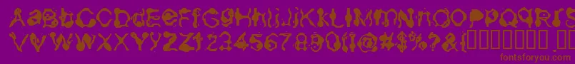 Шрифт Aneurysm – коричневые шрифты на фиолетовом фоне