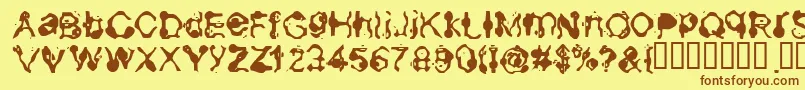 Aneurysm-Schriftart – Braune Schriften auf gelbem Hintergrund