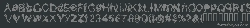 フォントAneurysm – 黒い背景に灰色の文字