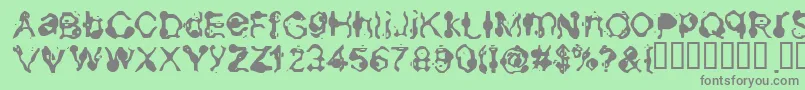 Aneurysm-Schriftart – Graue Schriften auf grünem Hintergrund