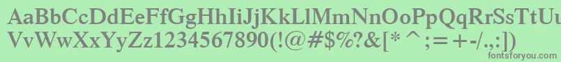 Dutch801SemiBoldBt-fontti – harmaat kirjasimet vihreällä taustalla