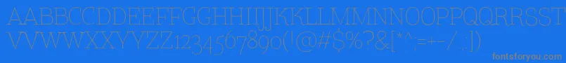 TtCoatsLightDemo Font – Gray Fonts on Blue Background