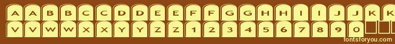 Asgravestones2-fontti – keltaiset fontit ruskealla taustalla