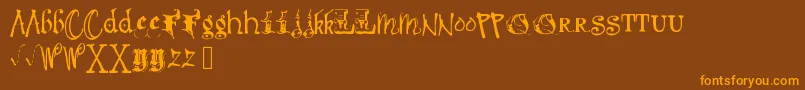 Debmixedfancy-Schriftart – Orangefarbene Schriften auf braunem Hintergrund