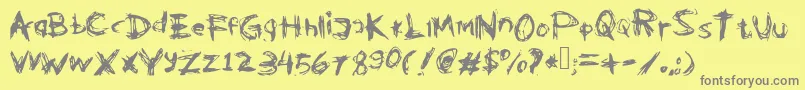 Kleptooperagrunge-fontti – harmaat kirjasimet keltaisella taustalla