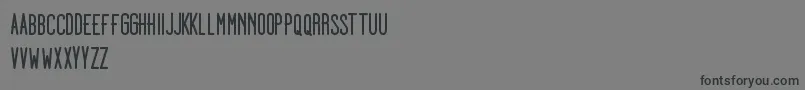 フォントDooodleistabold – 黒い文字の灰色の背景