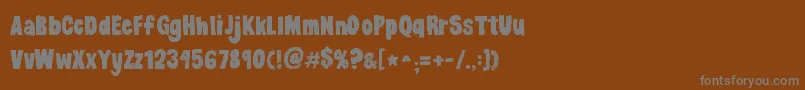 Kgdancingontherooftop Font – Gray Fonts on Brown Background