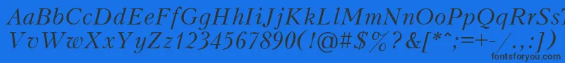 Czcionka MonteuideoItalic – czarne czcionki na niebieskim tle