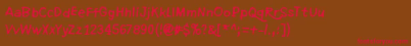 フォントRefuseToBowDown – 赤い文字が茶色の背景にあります。
