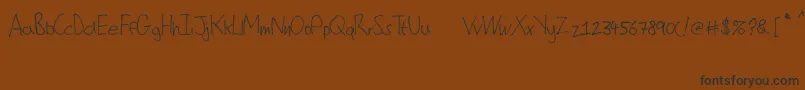 ChristophersScribble Font – Black Fonts on Brown Background
