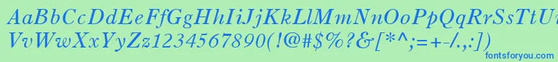 OldStyle7LtItalic-fontti – siniset fontit vihreällä taustalla
