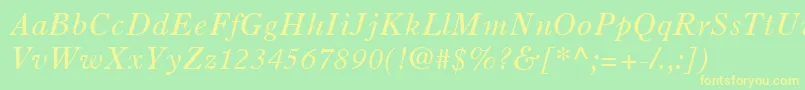 OldStyle7LtItalic-fontti – keltaiset fontit vihreällä taustalla