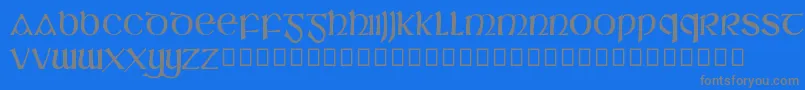 SlГЎine-Schriftart – Graue Schriften auf blauem Hintergrund