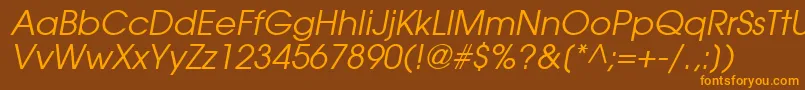 フォントTrendexSsiItalic – オレンジ色の文字が茶色の背景にあります。