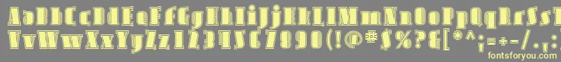 AvondaleInline Font – Yellow Fonts on Gray Background