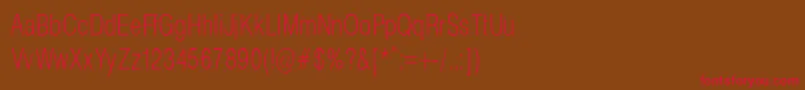 フォントHelveticaCondencedNormalRegular – 赤い文字が茶色の背景にあります。