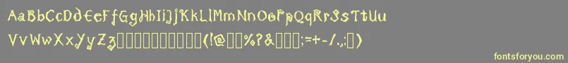 TricktreatsleepBoldRegular Font – Yellow Fonts on Gray Background