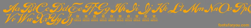 EnthrallPersonalUse-Schriftart – Orangefarbene Schriften auf grauem Hintergrund