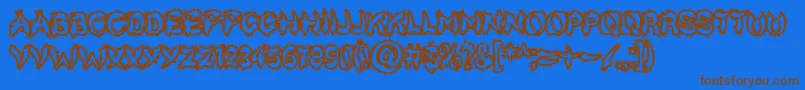 Kicktotheface Font – Brown Fonts on Blue Background