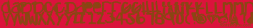 Adamskihand Font – Brown Fonts on Red Background