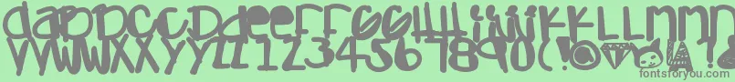 Czcionka Adamskihand – szare czcionki na zielonym tle