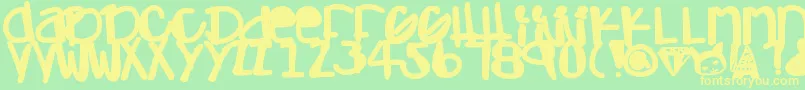 Adamskihand Font – Yellow Fonts on Green Background