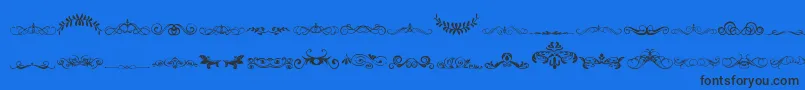 VintageDecorativeSigns5 Font – Black Fonts on Blue Background