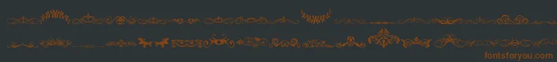 VintageDecorativeSigns5 Font – Brown Fonts on Black Background