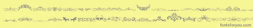 VintageDecorativeSigns5 Font – Gray Fonts on Yellow Background