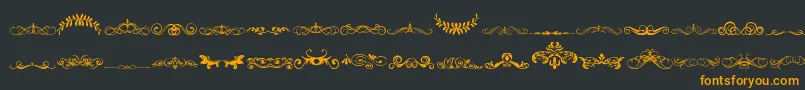 VintageDecorativeSigns5 Font – Orange Fonts on Black Background