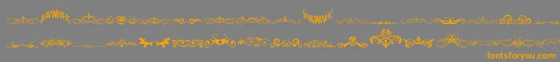 VintageDecorativeSigns5 Font – Orange Fonts on Gray Background